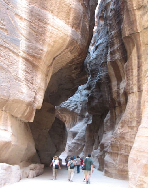 The soaring rock walls of Petra's siq are deep and winding. Photo by Margaret Deefholts